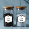 Glass jars with bamboo lids featuring pantry labels for clove and sugar, labeled in both English and Urdu, perfect for spice and kitchen storage.
