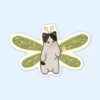 A whimsical sticker of a cat adorned with colorful dragonfly wings, titled "Fairy Cat Sticker."