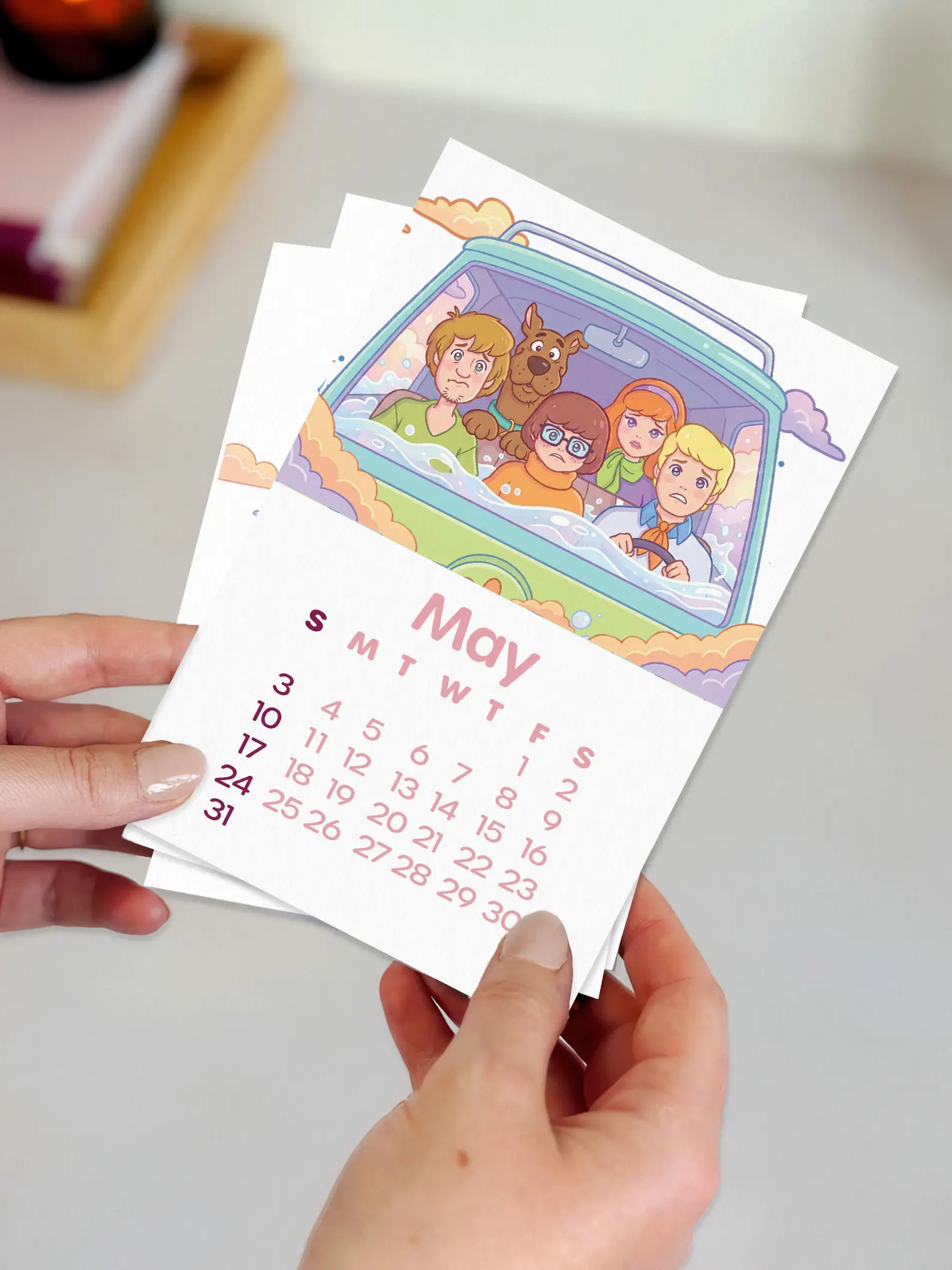 Nostalgic Cartoons 2026 Mini Desk Calendar in hand